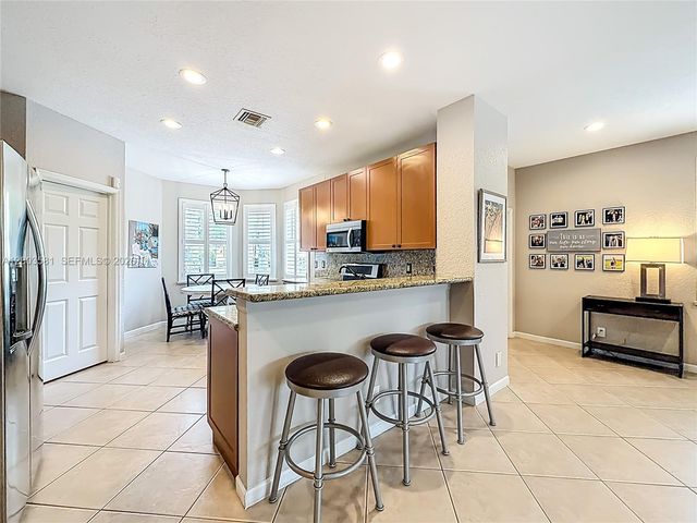 1668 Winterberry Ln, Weston, FL 33327