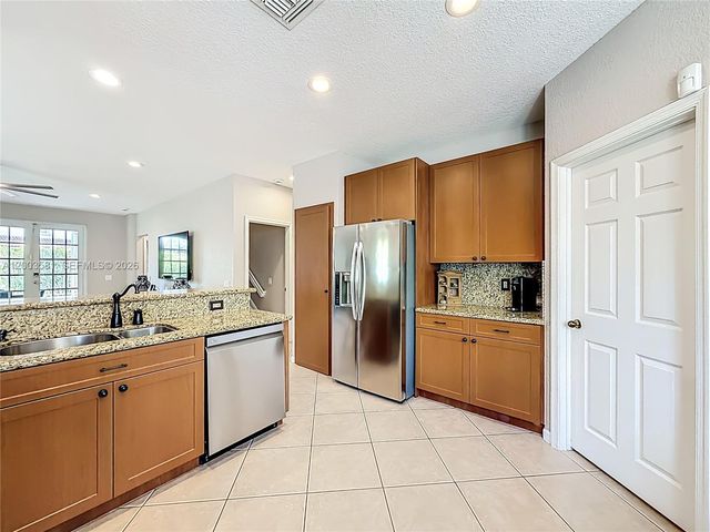 1668 Winterberry Ln, Weston, FL 33327