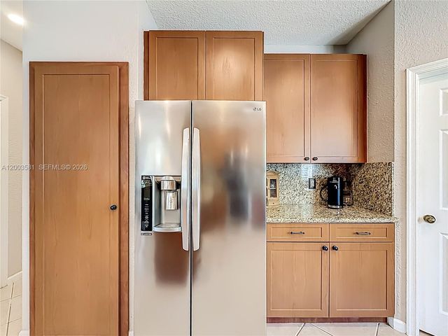 1668 Winterberry Ln, Weston, FL 33327