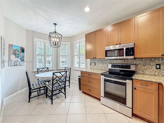 1668 Winterberry Ln, Weston, FL 33327