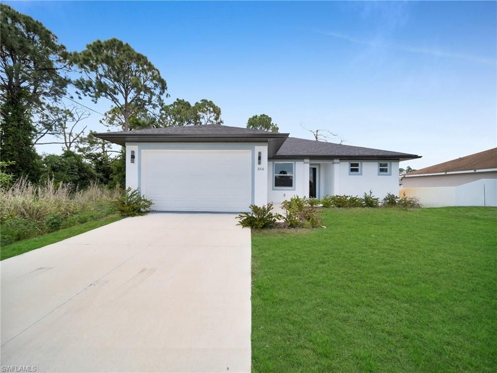 3210 30th ST SW, LEHIGH ACRES, FL 33976 — exterior