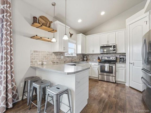 1106 Osprey Way, Wiggins, CO 80654