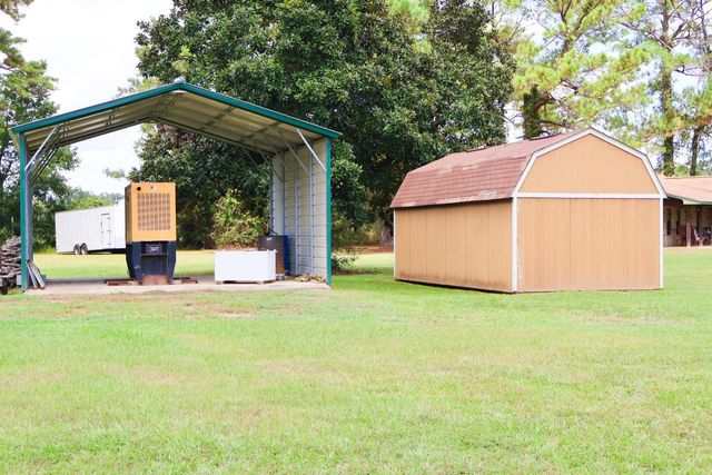 695 County Road 2309, Cleveland, TX 77327