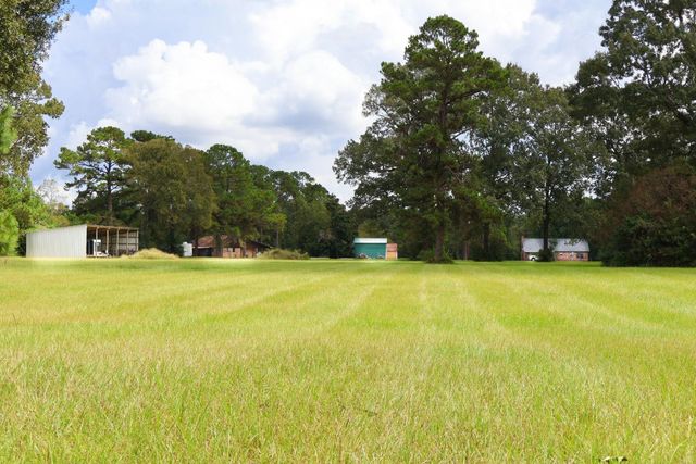 695 County Road 2309, Cleveland, TX 77327