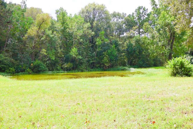 695 County Road 2309, Cleveland, TX 77327