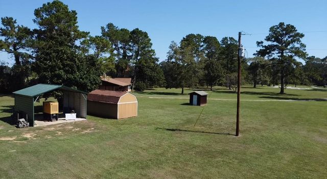 695 County Road 2309, Cleveland, TX 77327