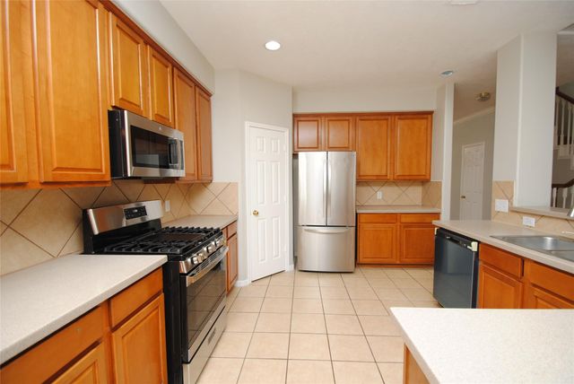 1115 Oxford Mills Lane, Sugar Land, TX 77479