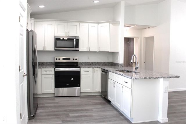 15 FISHER WAY PLACE, Ocklawaha, FL 32179