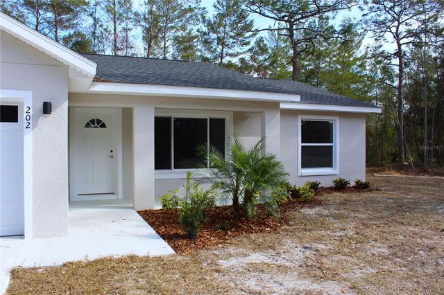 15 FISHER WAY PLACE, Ocklawaha, FL 32179