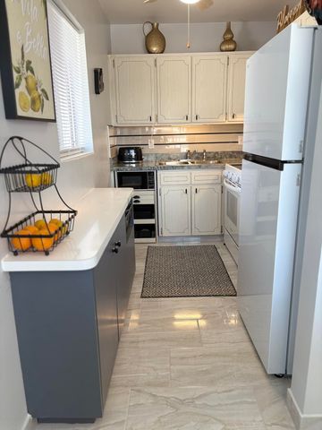 3280 Lake Osborne Drive 206, Lake Worth Beach, FL 33461