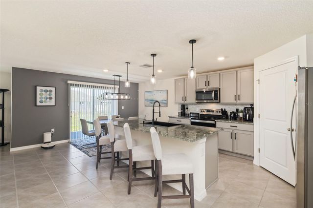 16673 WINDMILL FORGE PASS, Wimauma, FL 33598
