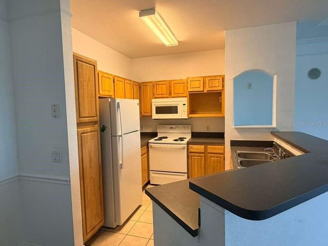 6413 ASTOR VILLAGE AVENUE 303, Orlando, FL 32835