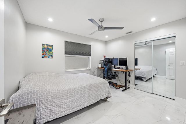 1077 Siena Oaks Circle E, Palm Beach Gardens, FL 33410