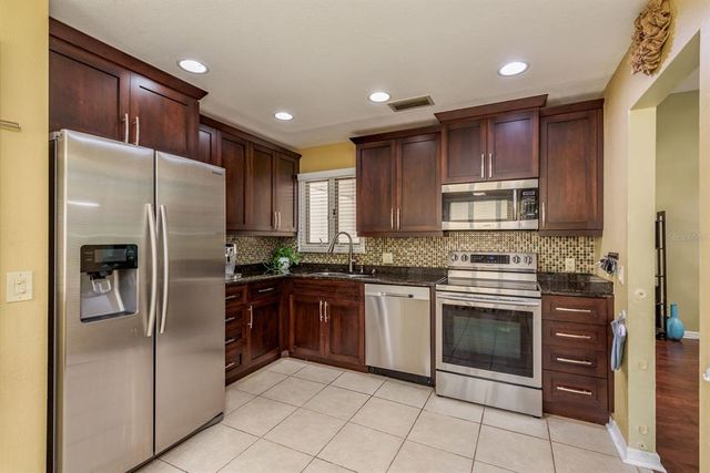 1023 LAKE AVOCA PLACE, Tarpon Springs, FL 34689
