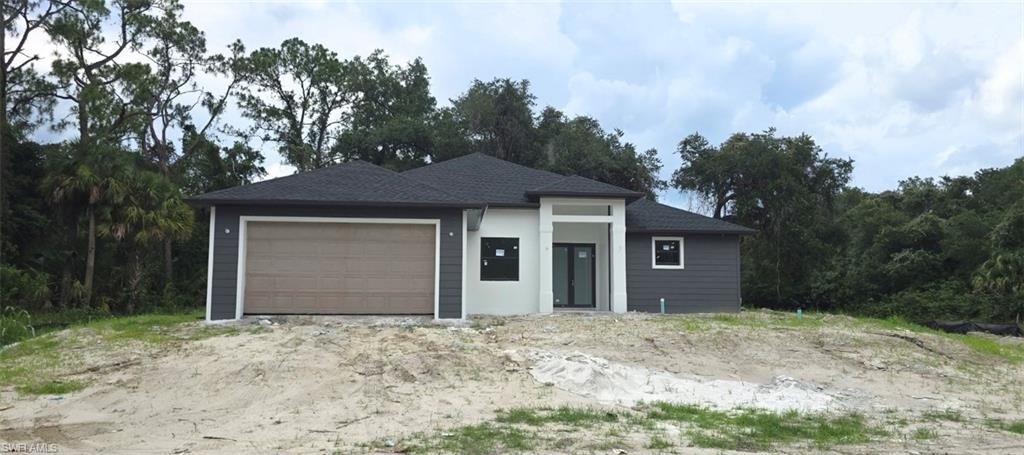 2407 E 19th ST, LEHIGH ACRES, FL 33972 — exterior