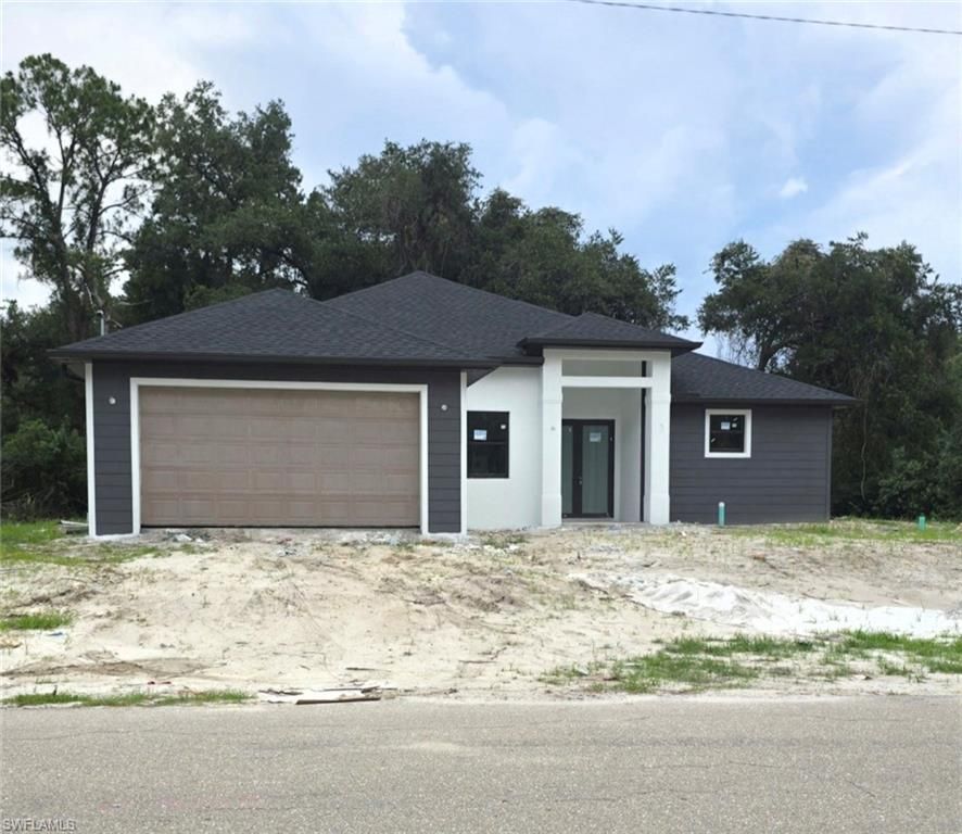 2407 E 19th ST, LEHIGH ACRES, FL 33972 — photo 2