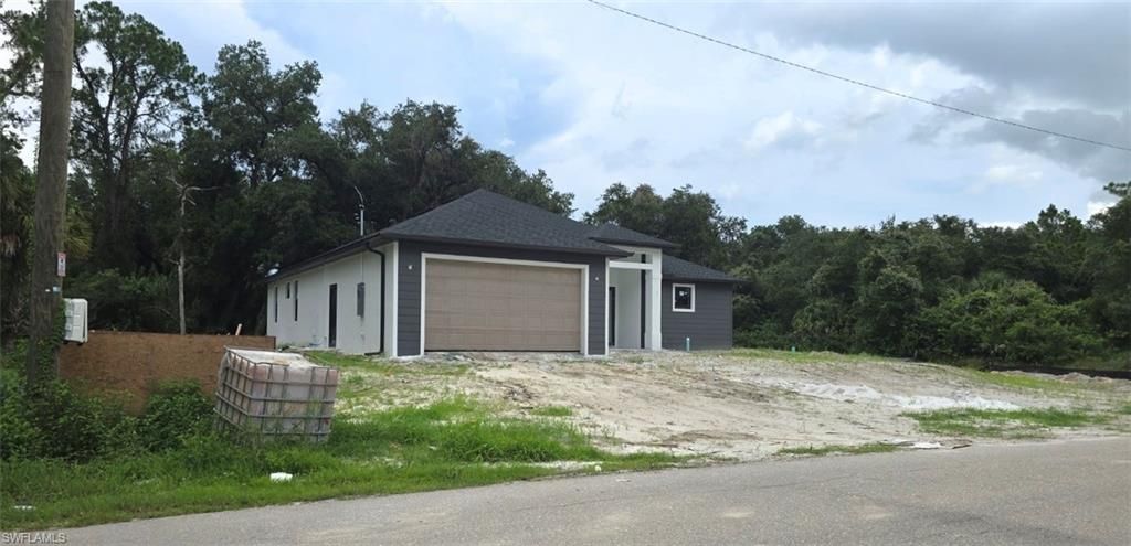 2407 E 19th ST, LEHIGH ACRES, FL 33972 — photo 3