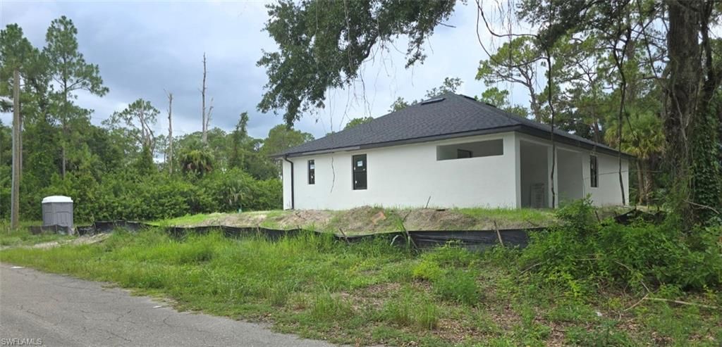 2407 E 19th ST, LEHIGH ACRES, FL 33972 — photo 4