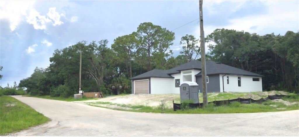 2407 E 19th ST, LEHIGH ACRES, FL 33972 — photo 5