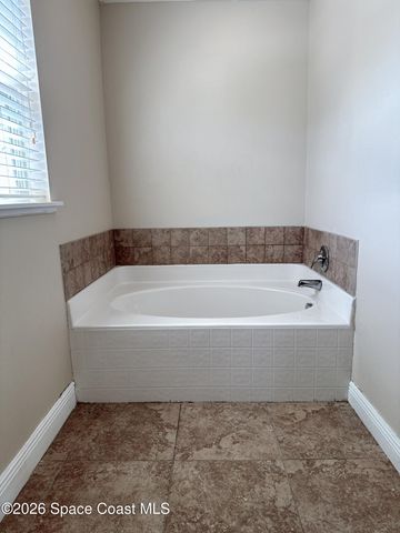 1718 Sawgrass Drive SW, Palm Bay, FL 32908