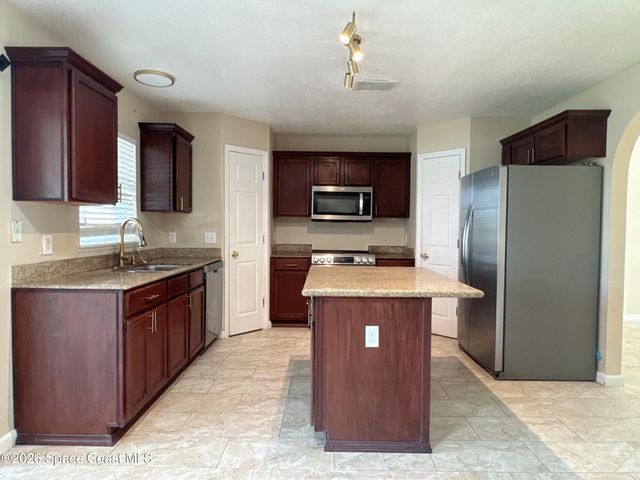 1718 Sawgrass Drive SW, Palm Bay, FL 32908