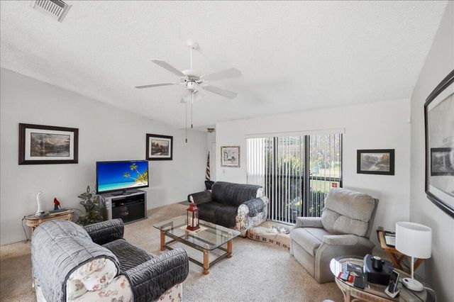 465 SE Asbury Lane, Port St. Lucie, FL 34983