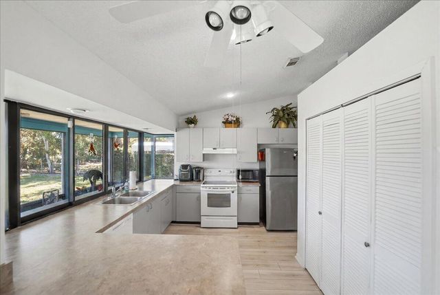 465 SE Asbury Lane, Port St. Lucie, FL 34983