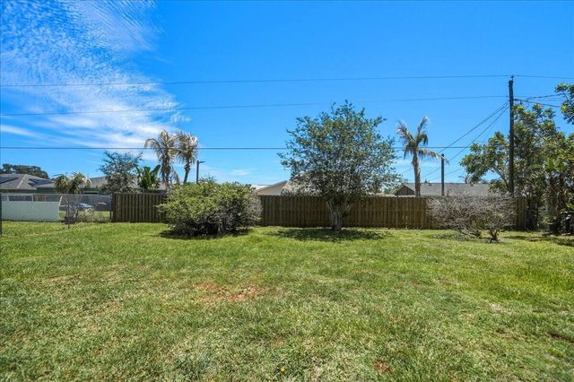 465 SE Asbury Lane, Port St. Lucie, FL 34983