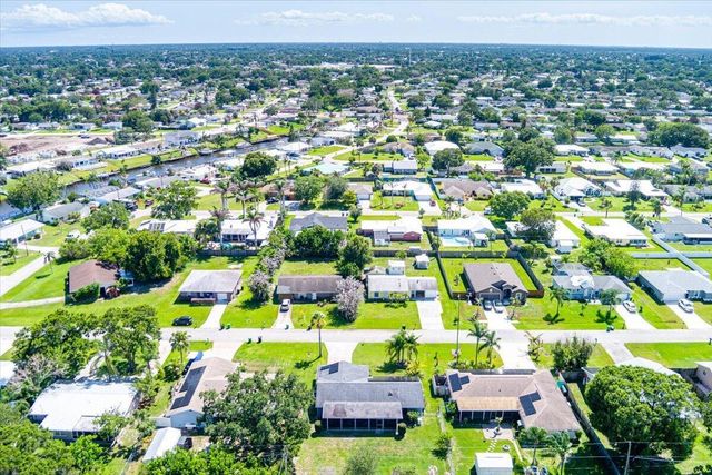 465 SE Asbury Lane, Port St. Lucie, FL 34983