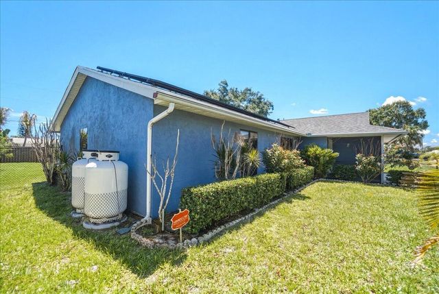 465 SE Asbury Lane, Port St. Lucie, FL 34983