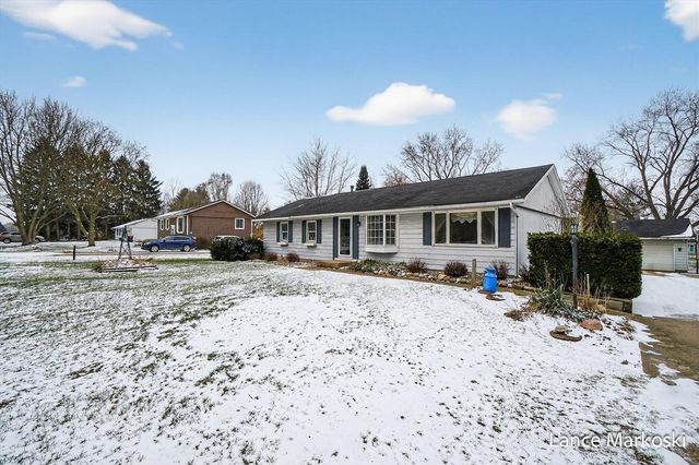 4162 Radstock Drive, Dorr, MI 49323