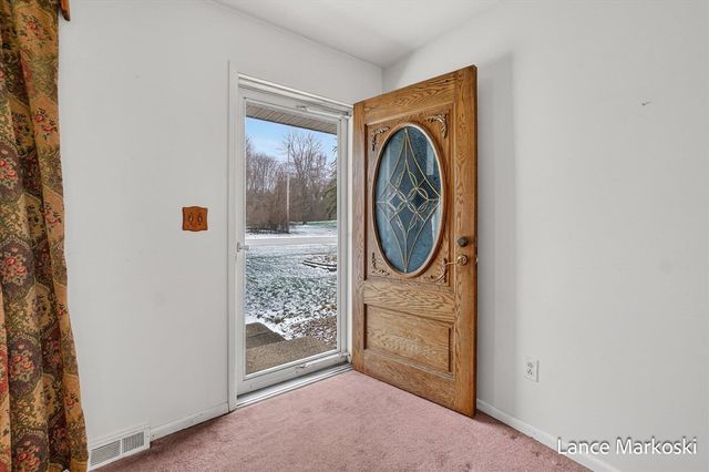 4162 Radstock Drive, Dorr, MI 49323