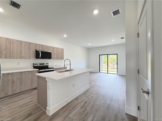 1266 Milwaukee BLVD, Lehigh Acres, FL 33974