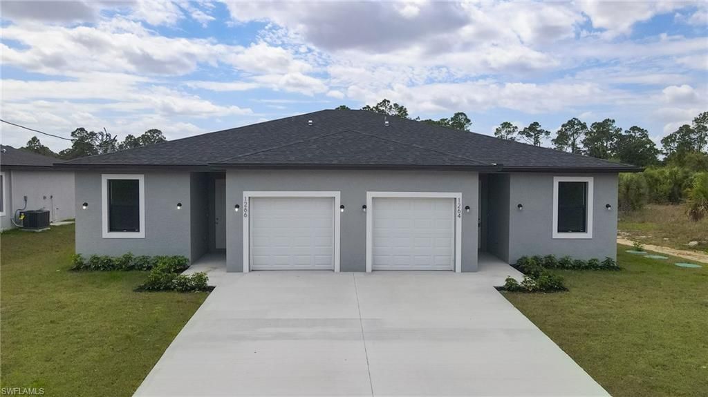 1266 Milwaukee BLVD, Lehigh Acres, FL 33974