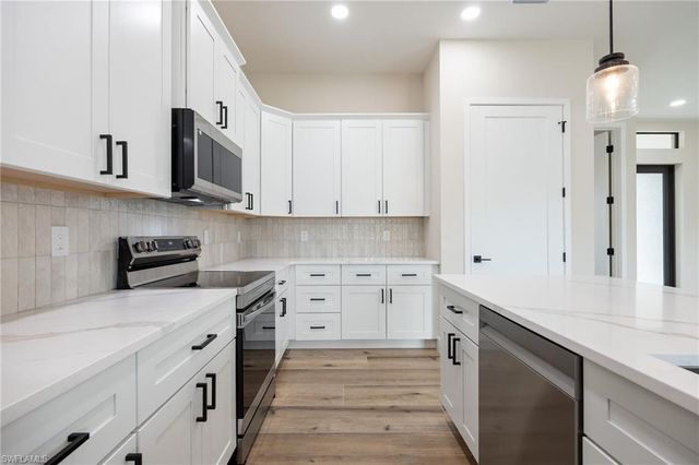 608 NW 3rd LN, Cape Coral, FL 33993
