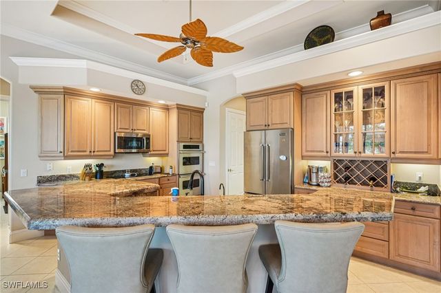 8983 Star Tulip CT, Naples, FL 34113