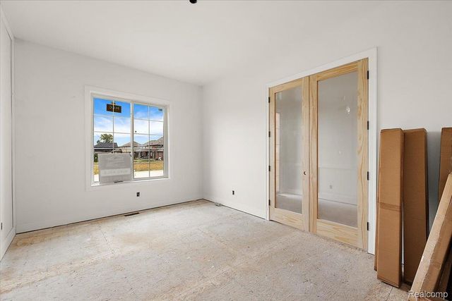 56703 Cortona Drive, Macomb Township, MI 48042