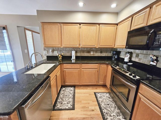 16890 SANDSTONE Circle, Macomb Twp, MI 48042