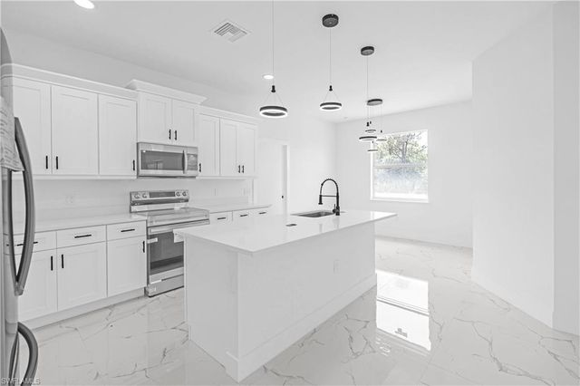 1905 Charles AVE N, Lehigh Acres, FL 33971