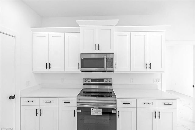 1905 Charles AVE N, Lehigh Acres, FL 33971