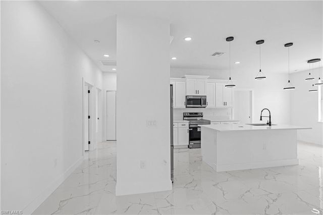 1905 Charles AVE N, Lehigh Acres, FL 33971