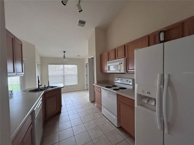 891 BEAVER RUN, Tavares, FL 32778