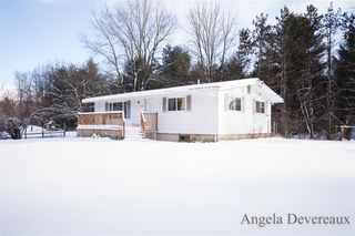 6040 N Hillman Road, Six Lakes, MI 48886