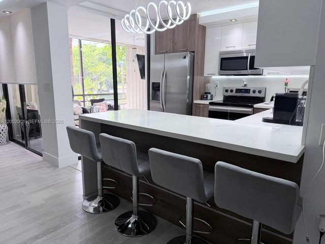 671 NE 195th St 208E, Miami, FL 33179