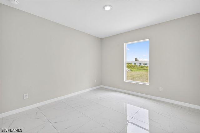 569 Aspen AVE S, Lehigh Acres, FL 33974