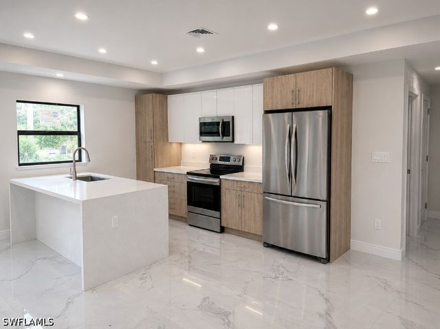569 Aspen AVE S, Lehigh Acres, FL 33974