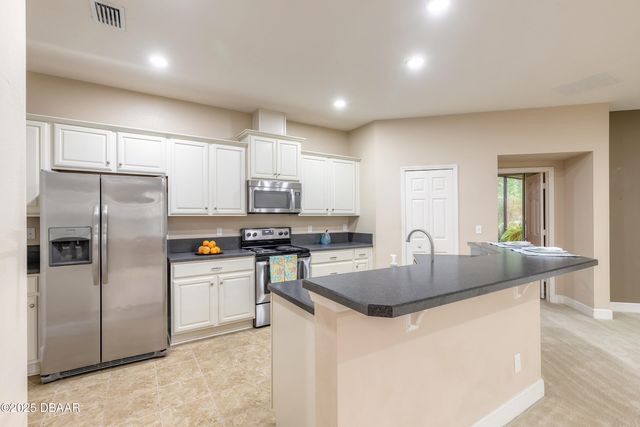 312 Grande Sunningdale Loop, Daytona Beach, FL 32124