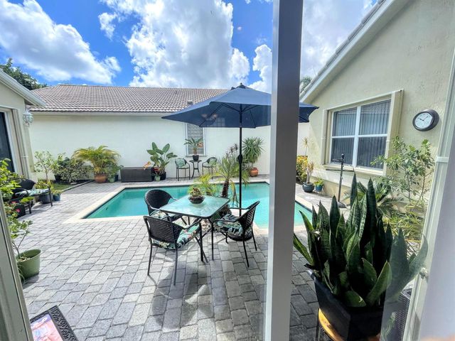 7060 NW Turtle Walk, Boca Raton, FL 33487
