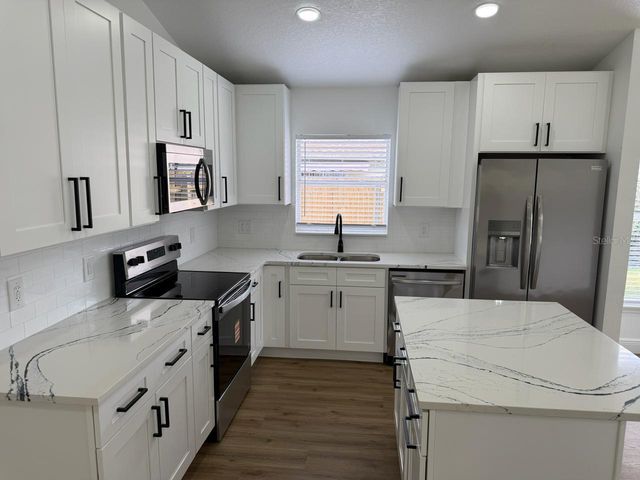 9743 HOLLYHILL DRIVE, Orlando, FL 32824