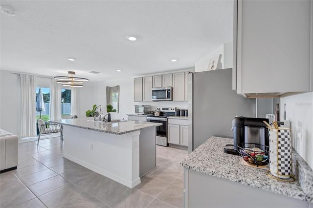 7601 ROSEWOOD GARDEN LOOP, Tampa, FL 33637